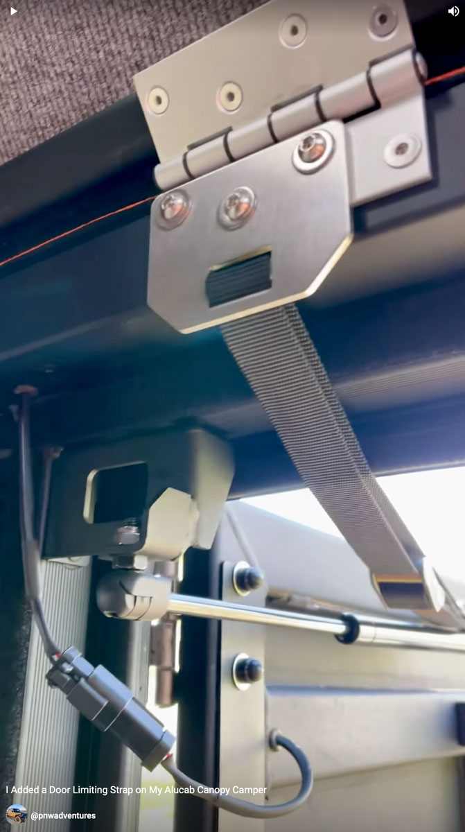 813fabrication.com door limiting strap for my alucab canopy camper